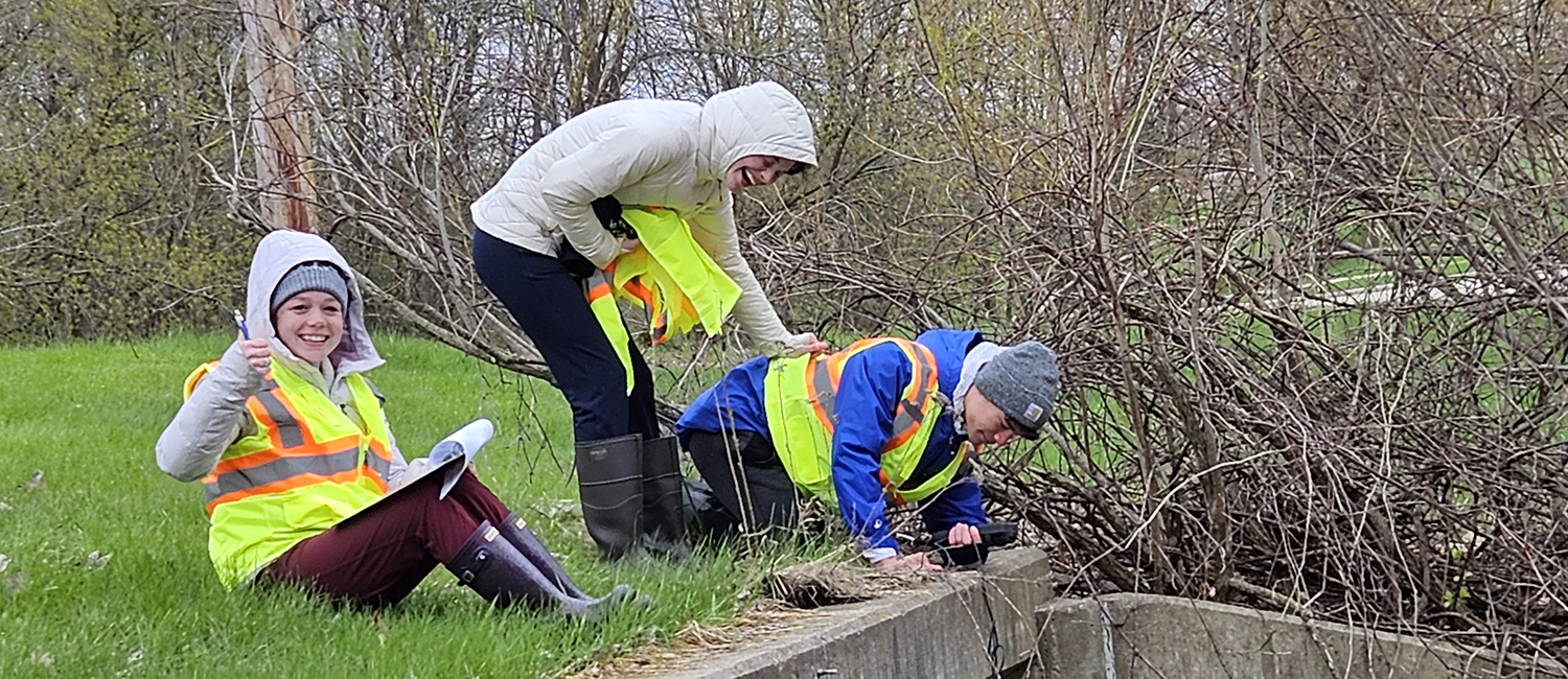 High School students conducting water quality monitoring